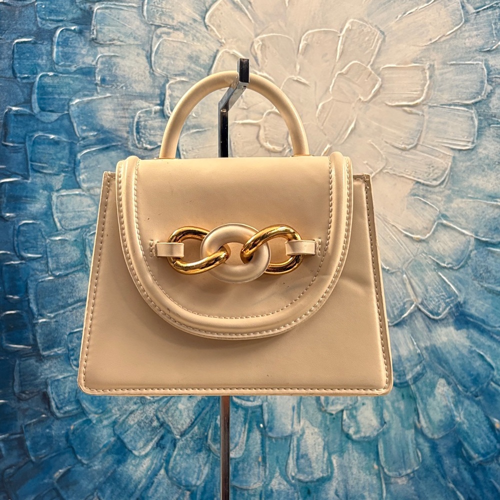 Elegant Zara Cream Handbag with Gold Accents